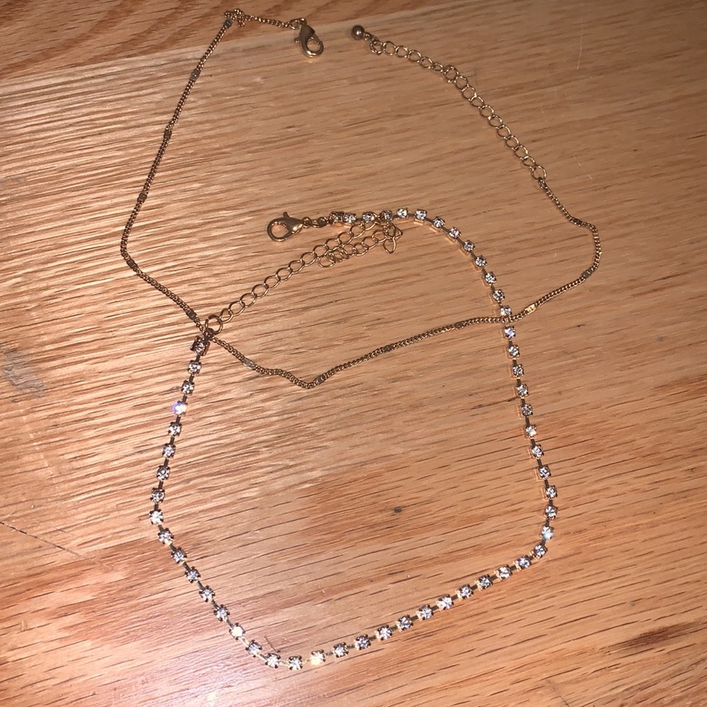 Two gold stackable chokers